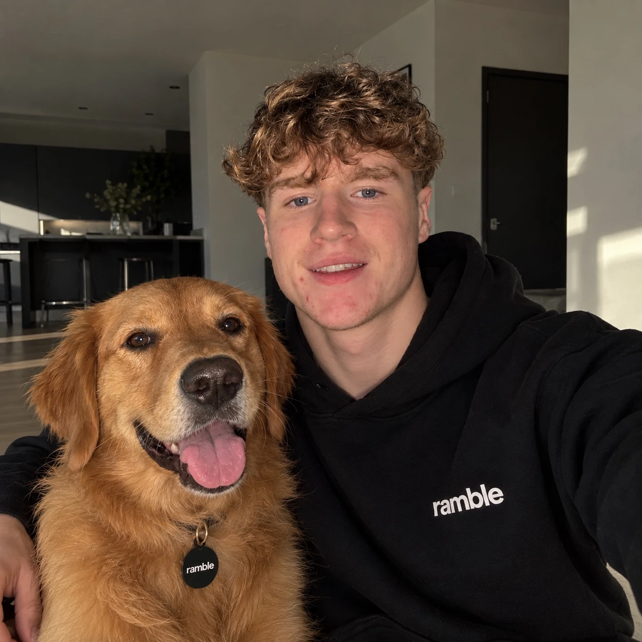 Leon, founder of Ramble, with his golden retriever
